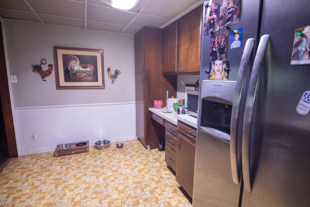 1181 Tracy Rd, Lawrenceburg, KY 40342 - kitchen featuring stainless steel fridge, a paneled ceiling, and light countertops