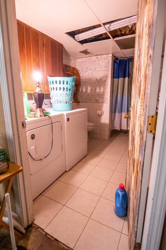 1181 Tracy Rd, Lawrenceburg, KY 40342 - laundry area with washing machine and clothes dryer and light tile patterned floors