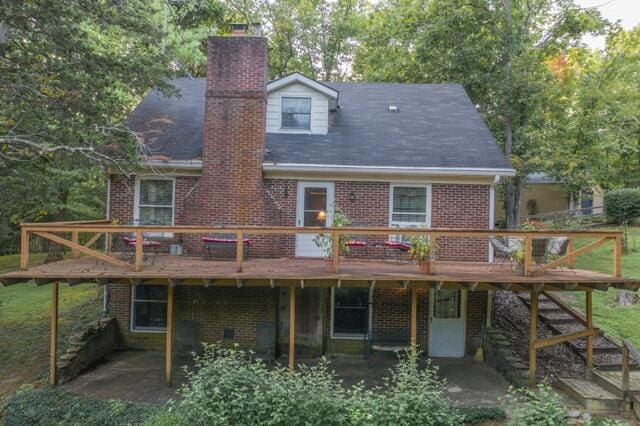 1181 Tracy Rd, Lawrenceburg, KY 40342 - back of house with a patio, brick siding, a chimney, and a deck