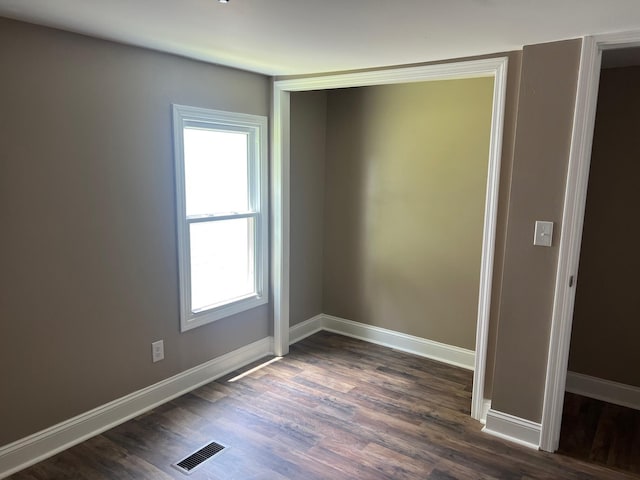 2441 Rogers Rd, Lancaster, KY 40444 - unfurnished room featuring dark wood-style floors and baseboards