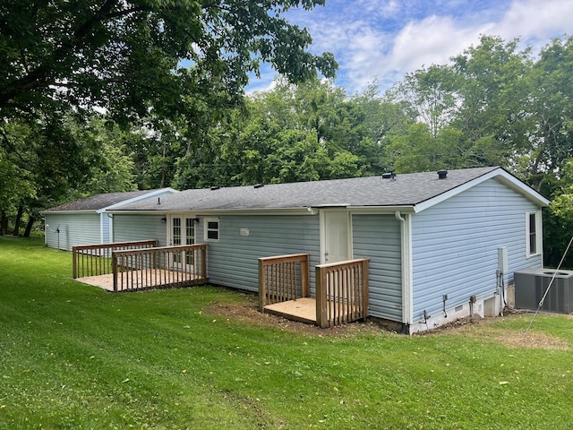 2441 Rogers Rd, Lancaster, KY 40444 - back of property with a wooden deck, a lawn, a shingled roof, and view of wooded area