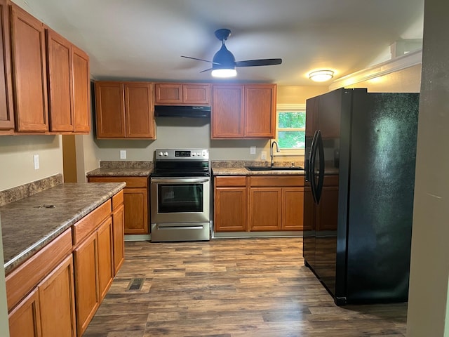 2441 Rogers Rd, Lancaster, KY 40444 - kitchen featuring black fridge, electric range, ventilation hood, ceiling fan, and dark wood-style flooring