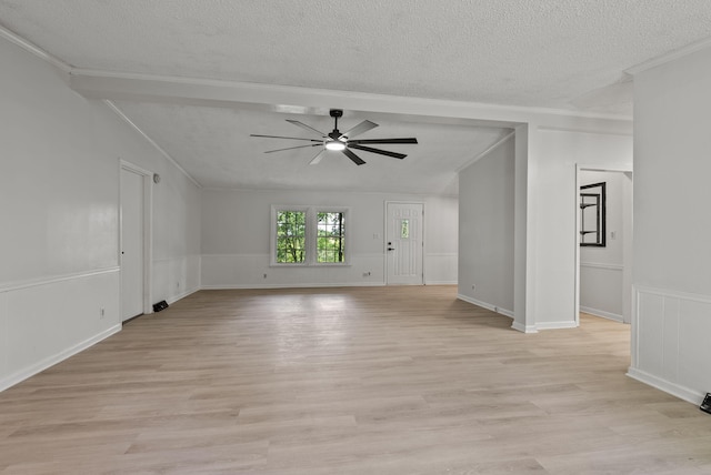 4822 US Highway 27 N, Cynthiana, KY 41031 - spare room featuring a textured ceiling, ceiling fan, crown molding, light wood-style flooring, and vaulted ceiling