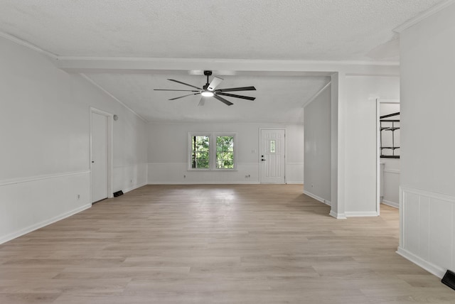 4822 US Highway 27 N, Cynthiana, KY 41031 - unfurnished living room with a ceiling fan, crown molding, a textured ceiling, light wood-style floors, and lofted ceiling