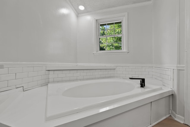 4822 US Highway 27 N, Cynthiana, KY 41031 - bathroom featuring ornamental molding, a bath, a textured ceiling, and a wainscoted wall