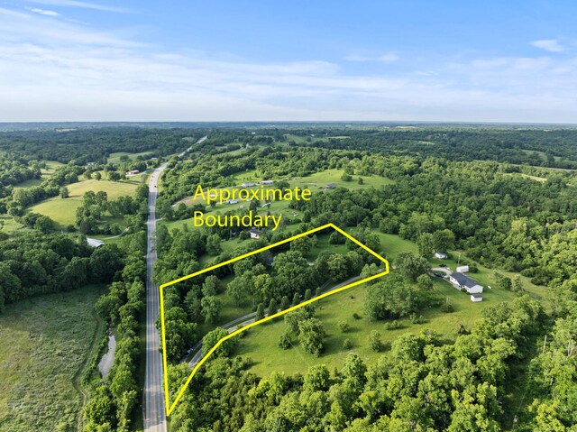 4822 US Highway 27 N, Cynthiana, KY 41031 - aerial view of property and surrounding area with a forest and property parcel outlined