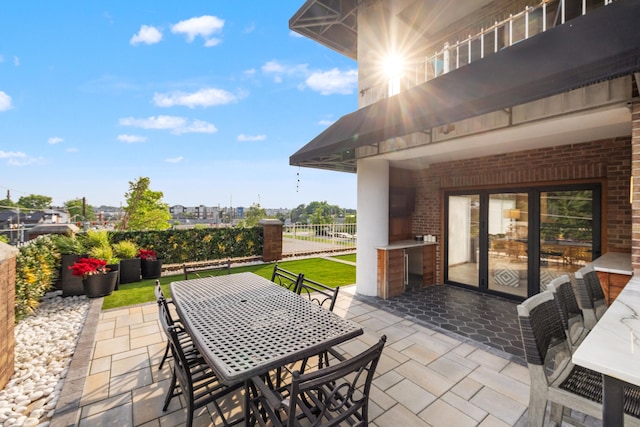 355 S Broadway Unit 102, Lexington, KY 40508 - view of patio featuring outdoor dining area