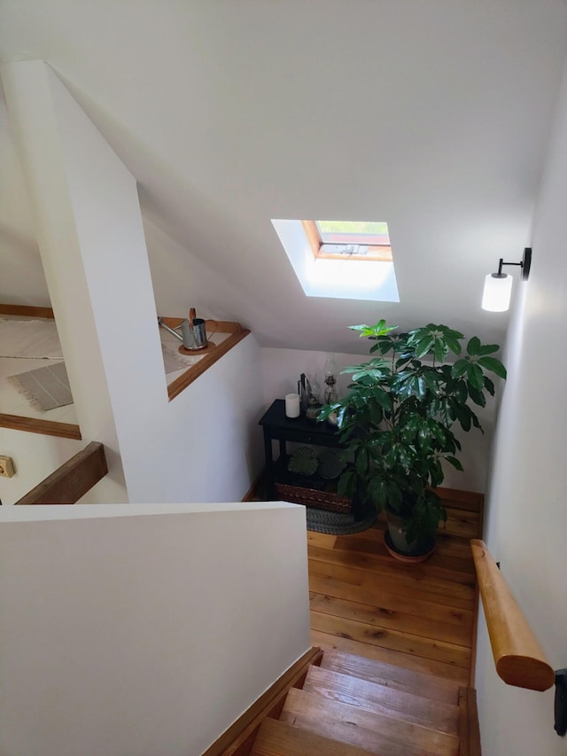 224 Pine Valley Rd, Berea, KY 40403 - staircase featuring a skylight, wood finished floors, and lofted ceiling