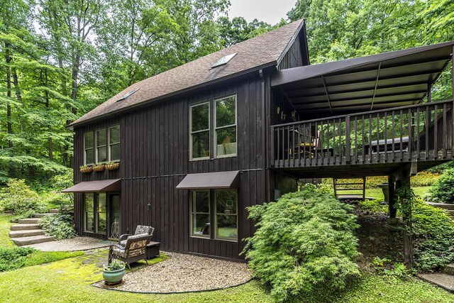 224 Pine Valley Rd, Berea, KY 40403 - rear view of house with a shingled roof and a deck