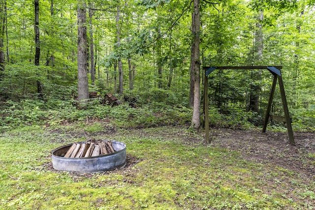 224 Pine Valley Rd, Berea, KY 40403 - view of yard featuring a view of trees and an outdoor fire pit