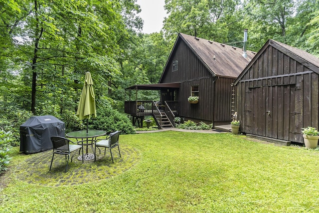 224 Pine Valley Rd, Berea, KY 40403 - view of grassy yard featuring a wooden deck, stairway, and an outbuilding