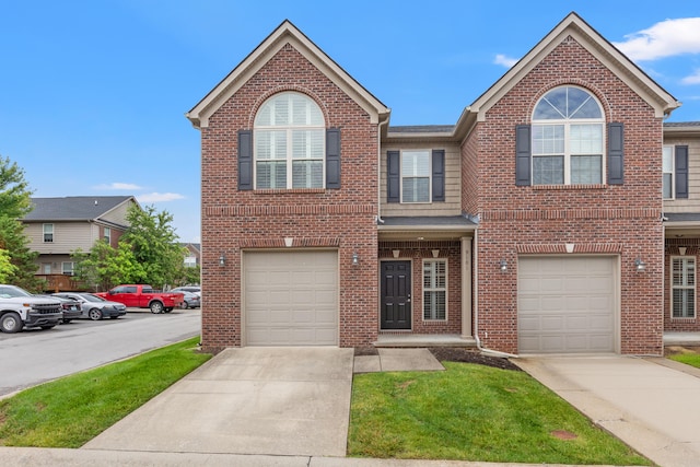 4464 Stuart Hall Blvd Unit 9101, Lexington, KY 40509 - townhome / multi-family property featuring brick siding, driveway, and an attached garage