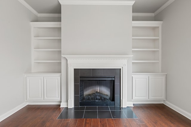 4464 Stuart Hall Blvd Unit 9101, Lexington, KY 40509 - detailed view of wood finished floors, crown molding, a tile fireplace, and built in shelves