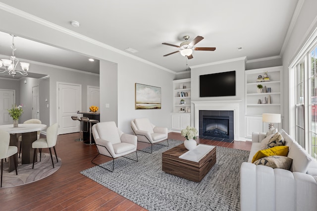 4464 Stuart Hall Blvd Unit 9101, Lexington, KY 40509 - living area featuring dark wood-type flooring, a ceiling fan, a tile fireplace, ornamental molding, and built in features