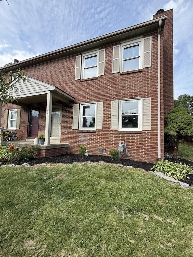 20 Heather Ln, Winchester, KY 40391 - townhome / multi-family property featuring brick siding, a front yard, and a porch