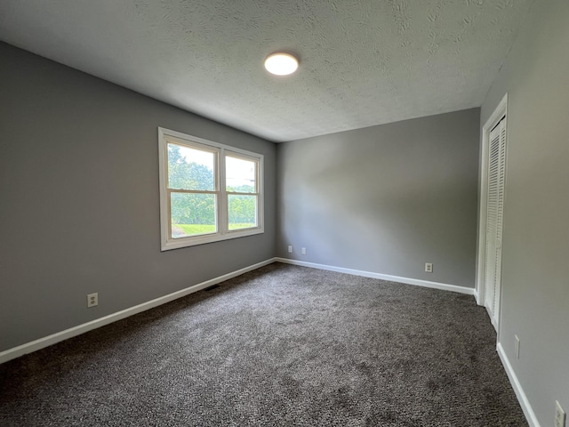 20 Heather Ln, Winchester, KY 40391 - unfurnished room featuring dark carpet and a textured ceiling