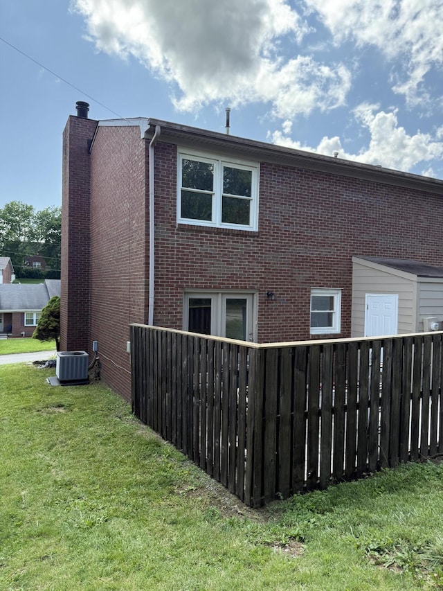 20 Heather Ln, Winchester, KY 40391 - rear view of property featuring brick siding and a chimney