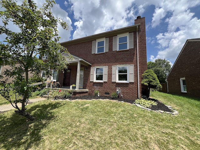 20 Heather Ln, Winchester, KY 40391 - view of front of home with a chimney, brick siding, and a front yard