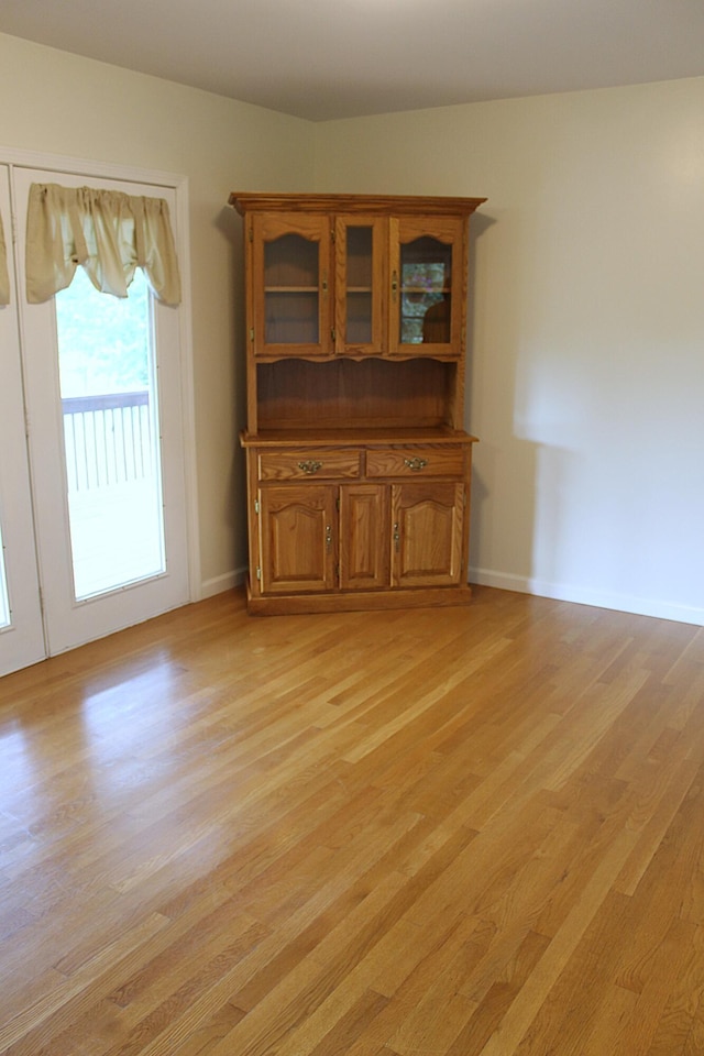 5515 Van Meter Rd, Winchester, KY 40391 - unfurnished living room featuring light wood-type flooring and baseboards