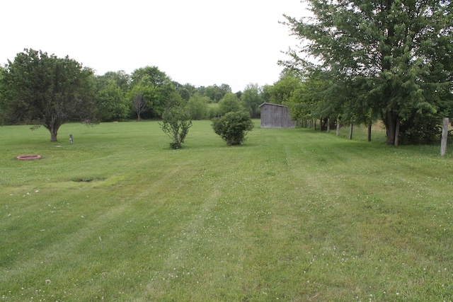 5515 Van Meter Rd, Winchester, KY 40391 - view of grassy yard featuring a barn and an outdoor structure