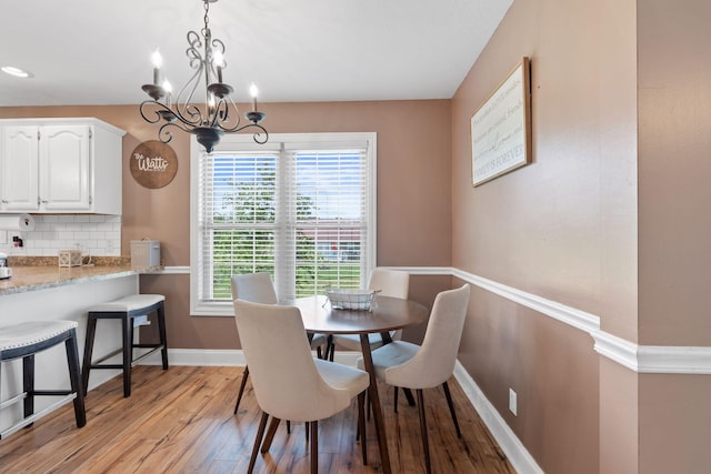 313 Man O War Ct, Lawrenceburg, KY 40342 - dining area featuring light wood finished floors and a chandelier