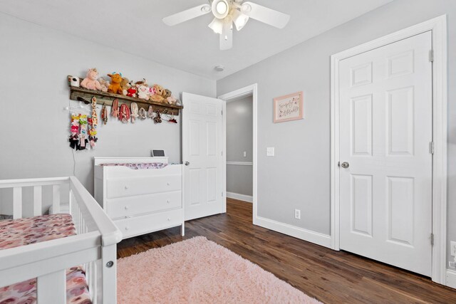 313 Man O War Ct, Lawrenceburg, KY 40342 - bedroom featuring wood finished floors, a crib, and ceiling fan