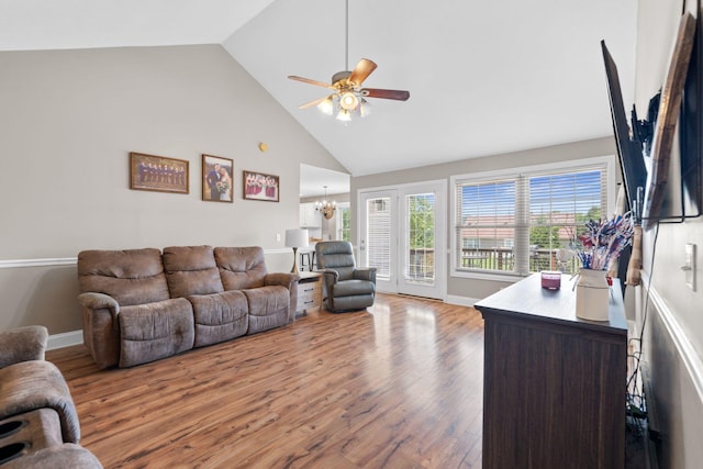 313 Man O War Ct, Lawrenceburg, KY 40342 - living room featuring high vaulted ceiling, a ceiling fan, a chandelier, and wood finished floors