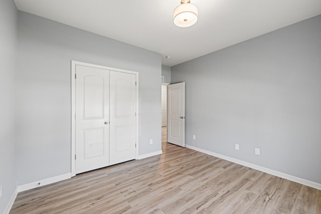 1152 Leanndra Park, Lexington, KY 40511 - unfurnished bedroom featuring light wood-style floors and a closet