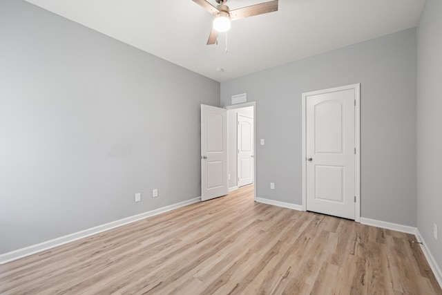1152 Leanndra Park, Lexington, KY 40511 - unfurnished bedroom featuring light wood-type flooring and a ceiling fan