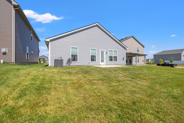 1152 Leanndra Park, Lexington, KY 40511 - rear view of property with a lawn and a patio