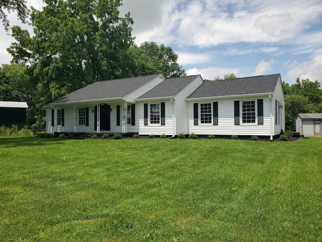 2941 Poindexter Rd, Cynthiana, KY 41031 - ranch-style home with a porch, a front yard, roof with shingles, and a storage shed