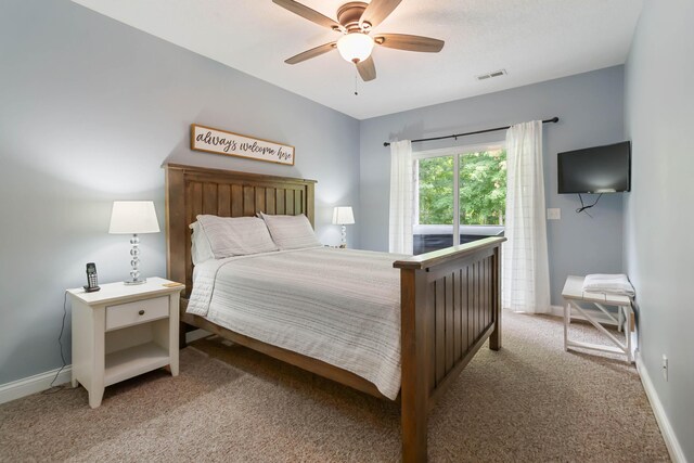 2394 Roberts Bend Rd, Burnside, KY 42519 - carpeted bedroom featuring access to outside and a ceiling fan