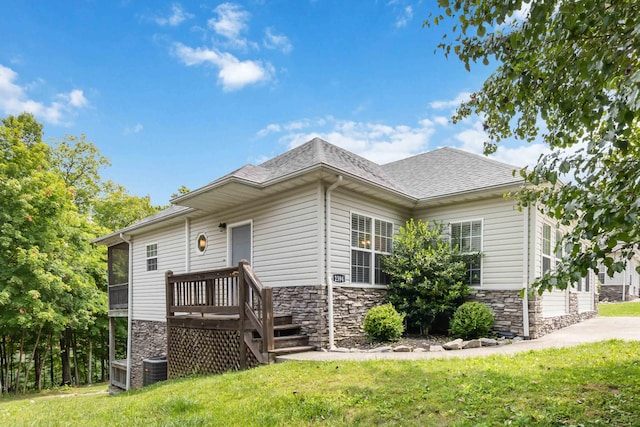 2394 Roberts Bend Rd, Burnside, KY 42519 - view of front of house with stone siding and a front lawn