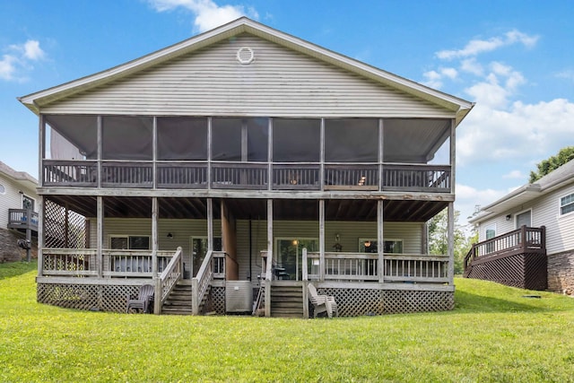 2394 Roberts Bend Rd, Burnside, KY 42519 - view of front of house featuring a wooden deck, a sunroom, and a front yard