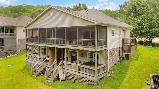 2394 Roberts Bend Rd, Burnside, KY 42519 - rear view of house featuring a sunroom, a wooden deck, a yard, and stairs