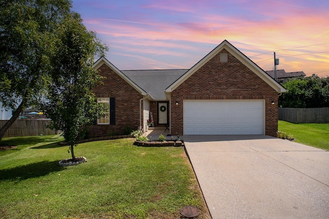 120 Eric Ct, Nicholasville, KY 40356 - traditional-style house with brick siding, an attached garage, and concrete driveway