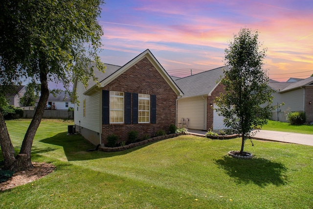 120 Eric Ct, Nicholasville, KY 40356 - view of front of property featuring brick siding, an attached garage, and driveway