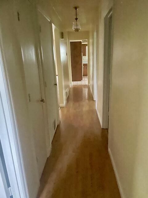 406 Forrest Dr, Lawrenceburg, KY 40342 - hallway with baseboards and wood finished floors