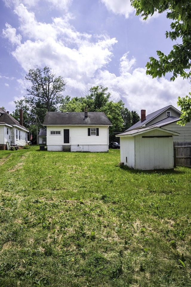 127 Locust Ave, Lexington, KY 40505 - rear view of house featuring a shed