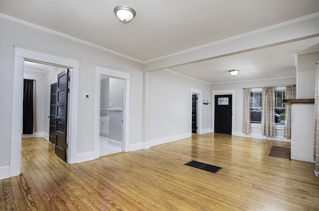 127 Locust Ave, Lexington, KY 40505 - entrance foyer with hardwood / wood-style flooring, crown molding, and a fireplace