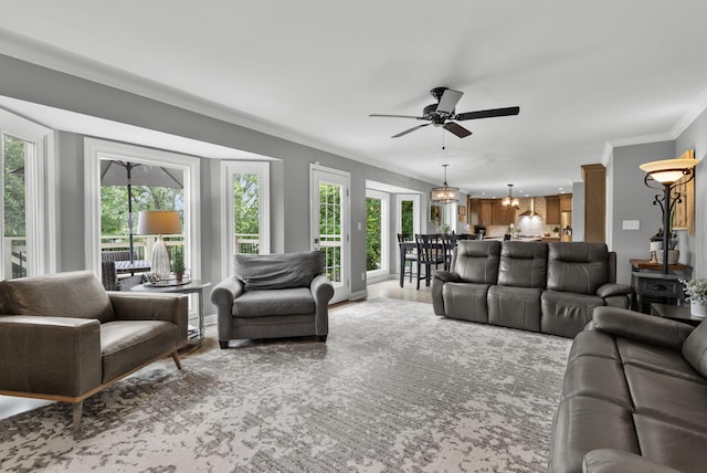 4109 Bridgemont Ln, Lexington, KY 40515 - living room with a ceiling fan, healthy amount of natural light, crown molding, and a chandelier