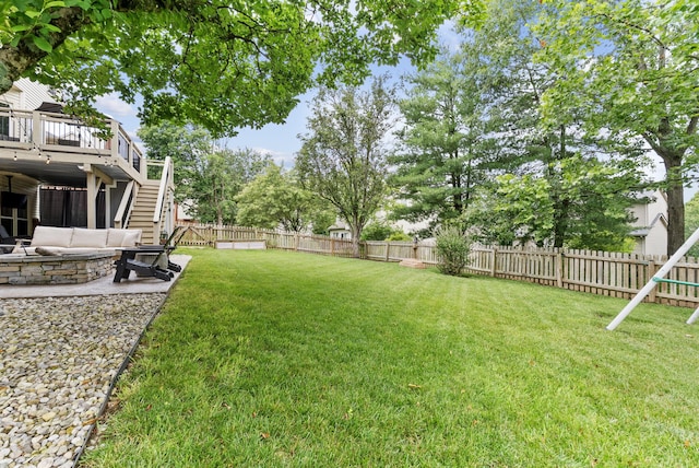 4109 Bridgemont Ln, Lexington, KY 40515 - fenced backyard featuring stairway, a patio area, and a wooden deck
