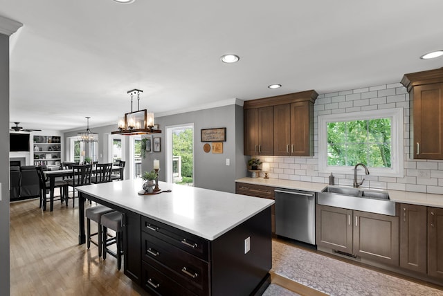 4109 Bridgemont Ln, Lexington, KY 40515 - kitchen with dishwasher, light countertops, decorative backsplash, recessed lighting, and wood finished floors