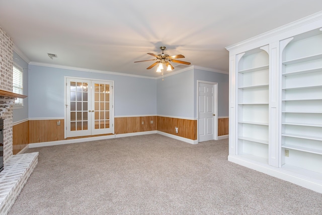 471 Westerfield Way Unit 40503, Lexington, KY 40503 - unfurnished living room featuring carpet, a ceiling fan, a wainscoted wall, french doors, and a fireplace