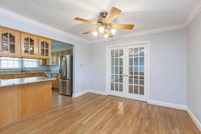 471 Westerfield Way Unit 40503, Lexington, KY 40503 - kitchen with stainless steel appliances, glass insert cabinets, light wood-style floors, french doors, and ornamental molding