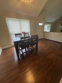 5 Abbey Ln, Middlesboro, KY 40965 - dining area featuring vaulted ceiling and dark wood-style floors