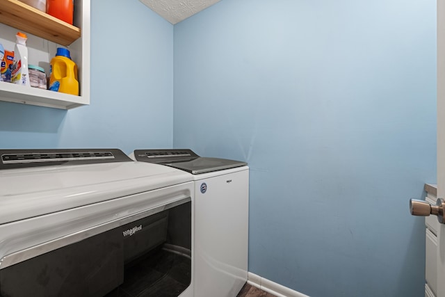 215 New Dixville Rd, Harrodsburg, KY 40330 - laundry room featuring washer and clothes dryer and baseboards