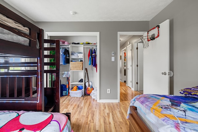 215 New Dixville Rd, Harrodsburg, KY 40330 - bedroom with a closet and wood finished floors