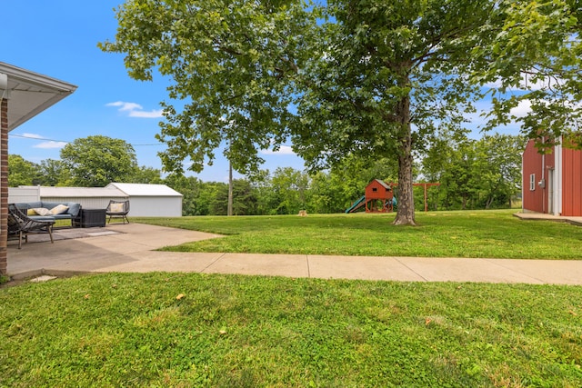215 New Dixville Rd, Harrodsburg, KY 40330 - view of grassy yard with a patio area and a playground