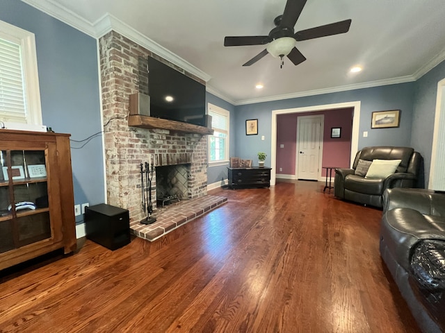 8585 Troy Pike, Versailles, KY 40383 - living room featuring wood finished floors, ornamental molding, a ceiling fan, and a brick fireplace
